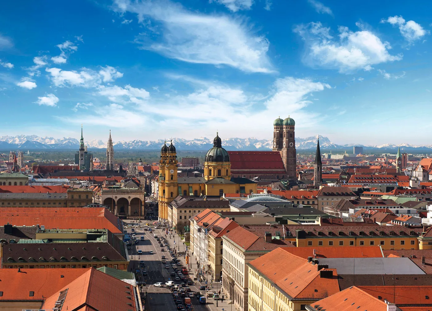 Rooftops of central Munich with the Alps on the horizon